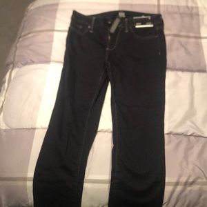 Dark washed mid rise skinny jeans